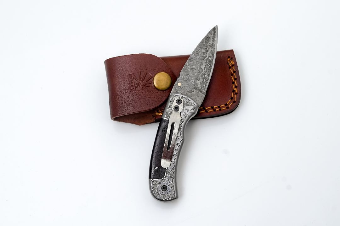 Hand-Forged Damascus Folding Knife | Engraved Bolster, Dark Wood Handle & Intricate Spine File Work TF-074