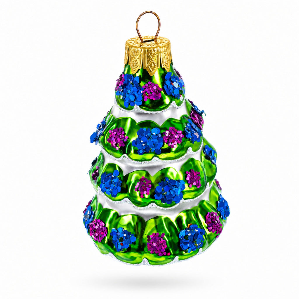 Snow-Covered Garland Tree Glass Christmas Ornament