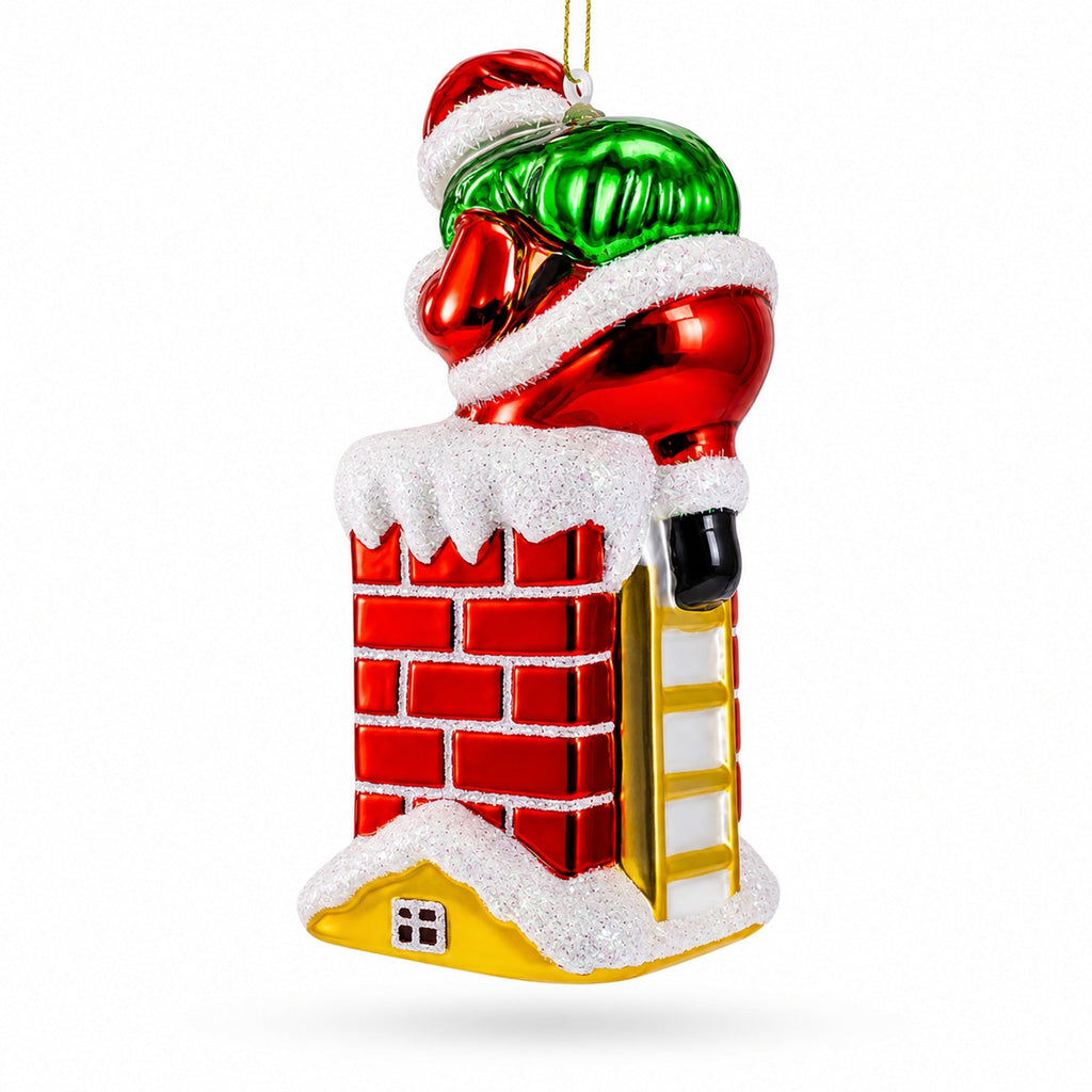 Santa Going Down the Chimney Glass Christmas Ornament