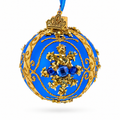 Gold Glitter Scrolls and Blue Gem Snowflake on Royal Blue Glass Ball Christmas Ornament