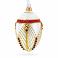 Red Jewels Eccentrics on White Glass Egg Ornament 4 Inches