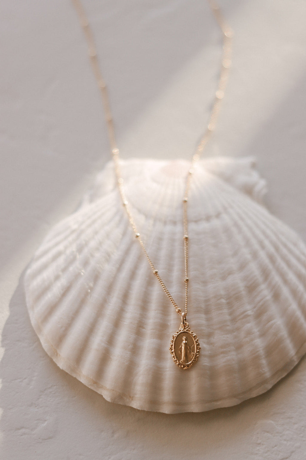 Intricate Miraculous medal necklace