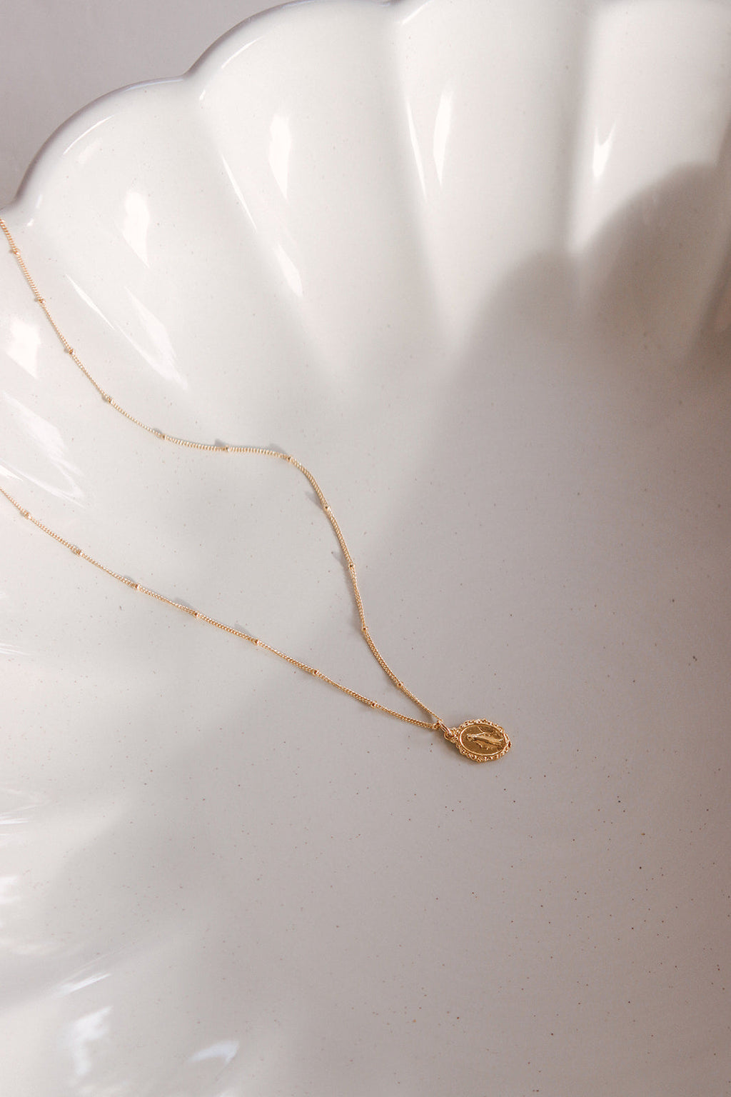 Intricate Miraculous medal necklace